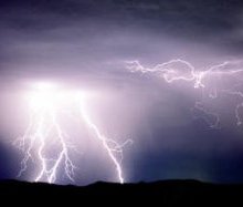 Lightning bolts against a dark sky