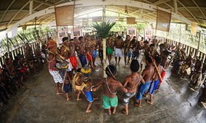 Munduruku native people alongside communities through the Tapajós lake region, whoever land are at risk from in the pipeline hydroelectric projects.